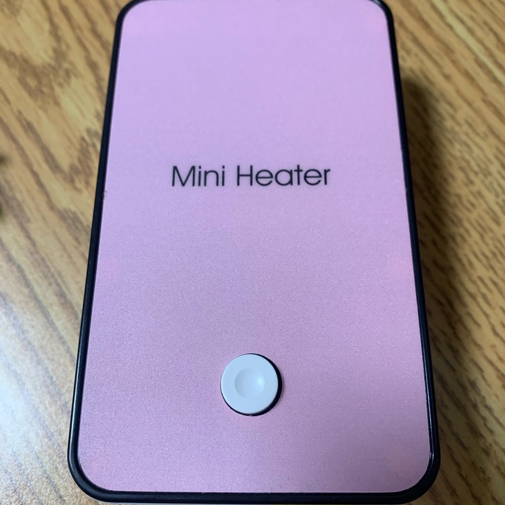 Mini desk plug in heater
